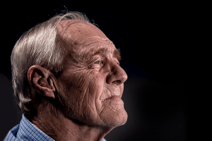 old man hearing aid hearing